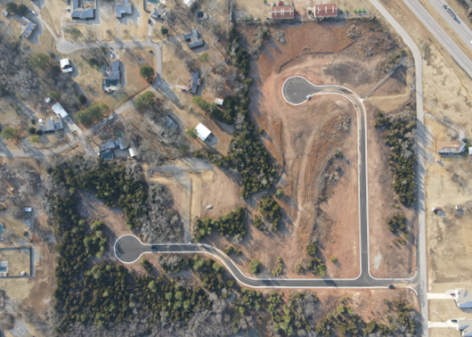 Drone image of HAKTO’s Village West development from clearing to roads in Shawnee, OK